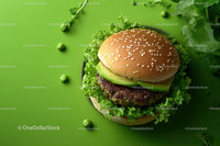 Fresh Cheeseburger with Lettuce and Cheese on a White Plate