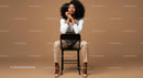 Stylish Confident Woman Sitting on Chair in Modern Studio