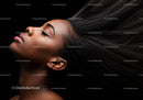 Side profile of peaceful woman with flowing dark hair