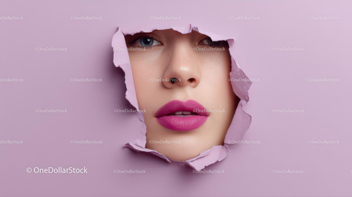 Close-Up Portrait of a Glamorous Model with Pink Lipstick