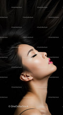 Serene Woman with Closed Eyes and Flowing Black Hair