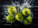 Green Apples Splashing Water Into Lake Creating Fresh Juicy Scene