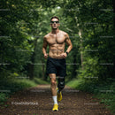 Male Runner with Prosthetic Leg Running Through Foggy Forest Trail