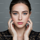 Elegant Portrait of a Young Woman with Bright Blue Eyes and Perfect Skin