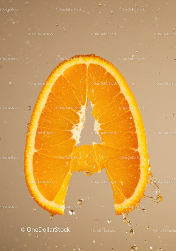 Fresh juicy orange slice with water droplets