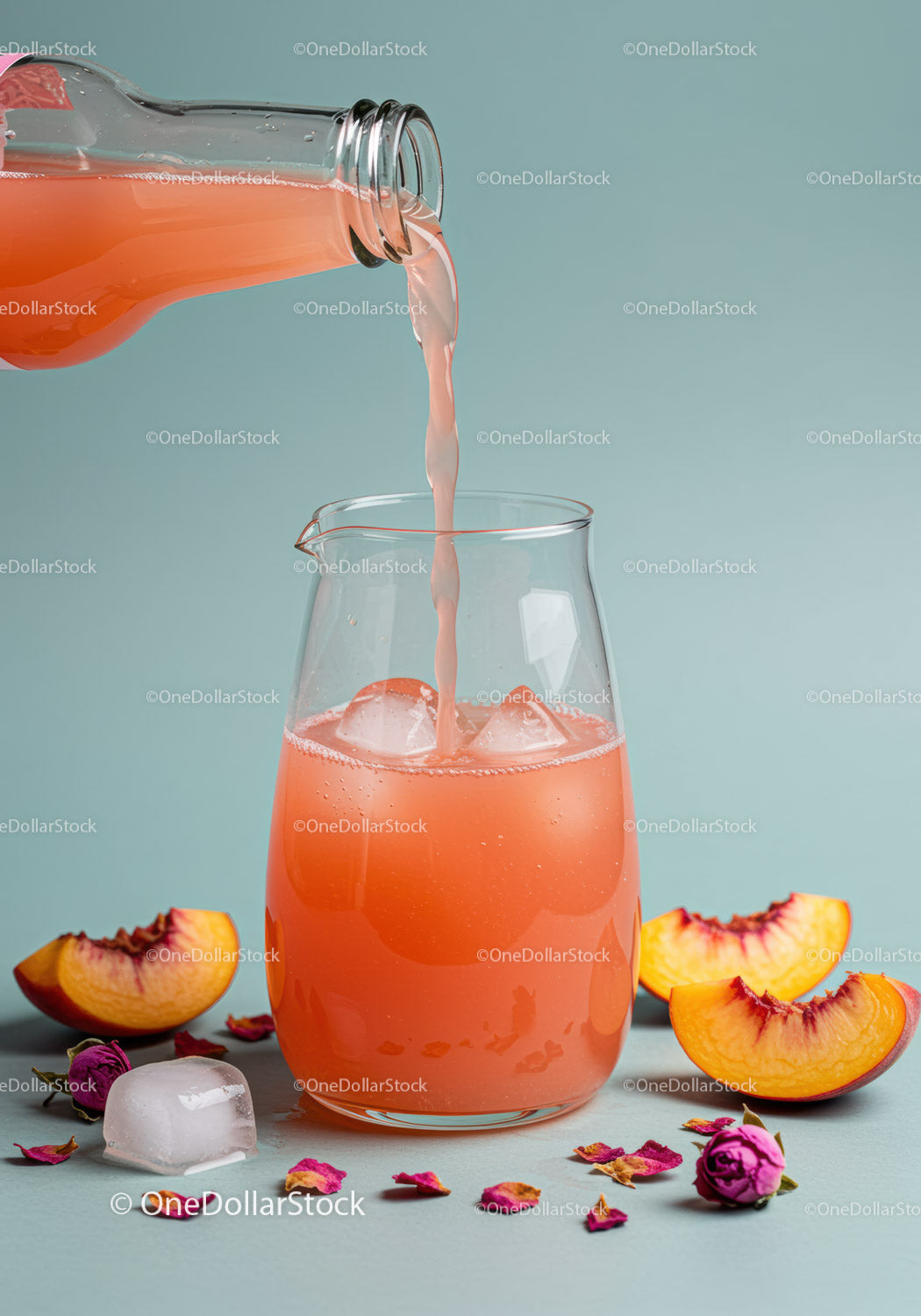 Refreshing peach juice poured over ice in clear glass