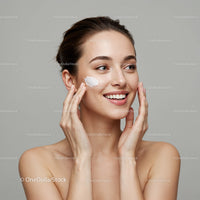 Young Woman Applying Facial Moisturizer for Healthy Glowing Skin
