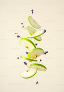 Floating green apple slices with lavender flowers