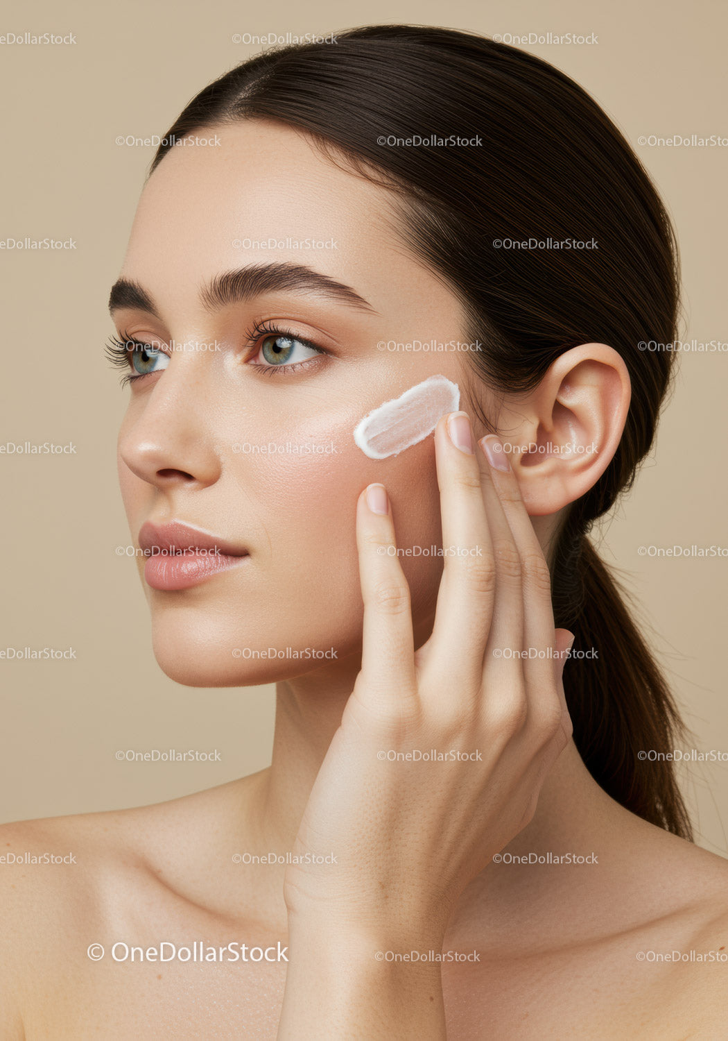 Close-Up of Woman Applying Face Cream for Skincare Routine