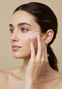 Close-Up of Woman Applying Face Cream for Skincare Routine
