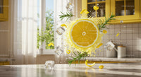 Fresh lemon slice with rosemary and ice cubes splash