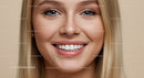 Close up of smiling young woman with clear skin