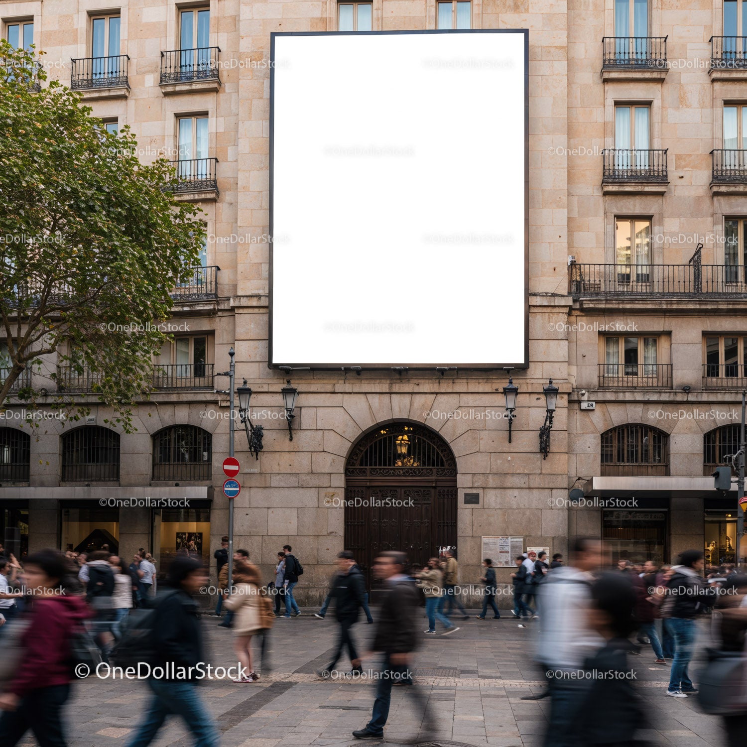 Crowded urban street with blank billboard on historic building