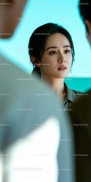 Thoughtful young woman engaged in conversation
