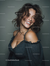 Joyful Woman with Wavy Hair Wearing Dark Blouse
