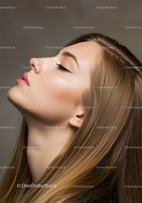 Profile of a calm young woman with flawless skin