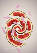 Fresh Fig Slices Arranged with Pink Flower Petals