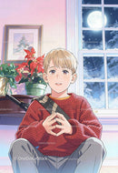 Young boy in cozy sweater sitting by snowy window