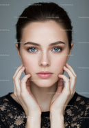 Elegant Portrait of a Young Woman with Blue Eyes and Black Lace Dress