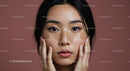 Young Woman Applying Facial Patches for Skincare Routine
