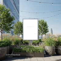 Blank billboard on urban rooftop garden with greenery