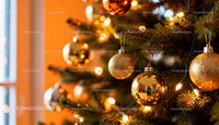 Golden Christmas Ornaments Hanging on Festive Tree Branch