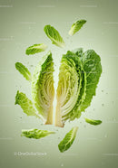 Fresh romaine lettuce halves with scattered leaves