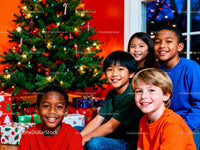Joyful diverse children celebrating Christmas together