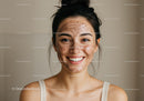 Smiling Woman with Flawless Skin and Natural Beauty