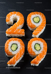 Creative Sushi Rolls Shaped as Number 29 on Black Plate