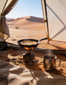 Morning Flatbread Cooking on Portable Stove in Desert Tent
