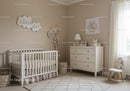 Cozy Nursery Room with White Crib and Soft Child Bedroom Decor