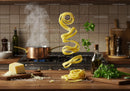 Fresh pasta swirling with herbs and spices in kitchen