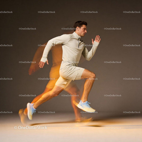Athlete Sprinting with Motion Blur on Neutral Background