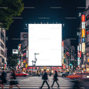 Busy Urban Crosswalk with Illuminated Billboard at Night