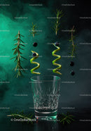 Floating fresh ingredients above empty cut glass