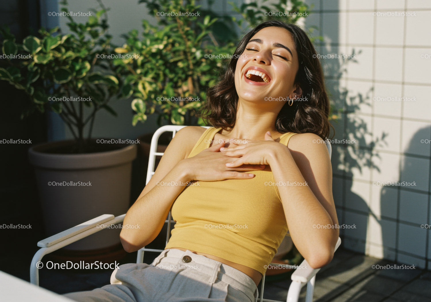 Joyful Woman in Yellow Tank Top Enjoying Sunlight Outdoors