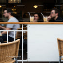 Two glasses with drinks in cozy café setting
