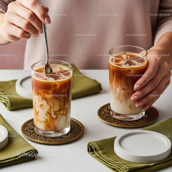 Layered Iced Coffee with Cream in Clear Glasses