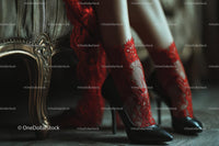 Chic Black Heels and a Red Lace Dress in a Cozy Bedroom Setting