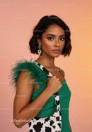 Stylish Young Woman in Green Dress with Feathered Detail Strong Pose