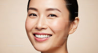 Close up of cheerful Asian woman smiling warmly