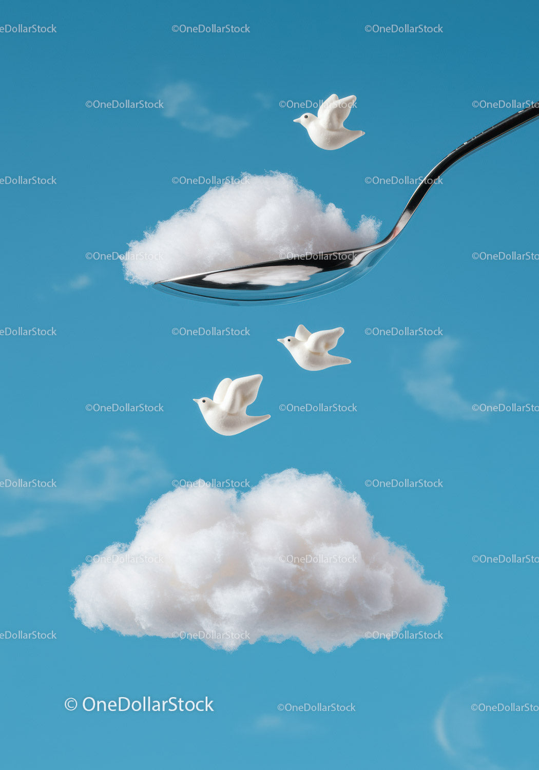 White birds flying over spoon with fluffy cloud