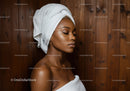 Serene Woman Relaxing with Towel during Spa Treatment