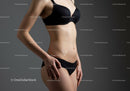 Elegant Female Model in Black Lingerie with Slim Toned Waist