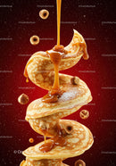 Swirling Pancakes Drizzled with Caramel and Hazelnuts