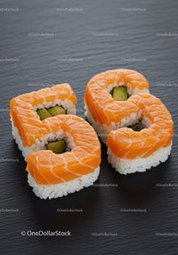 Creative salmon sushi rolls shaped as numbers fifty eight
