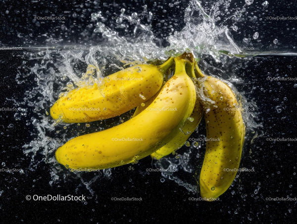Fresh Yellow Bananas Splashing into Water a Vibrant Fruit Display