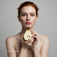 Elegant Woman with Fresh Pear in Minimalist Setting