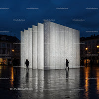 Modern White Perforated Facade Building Illuminated at Night